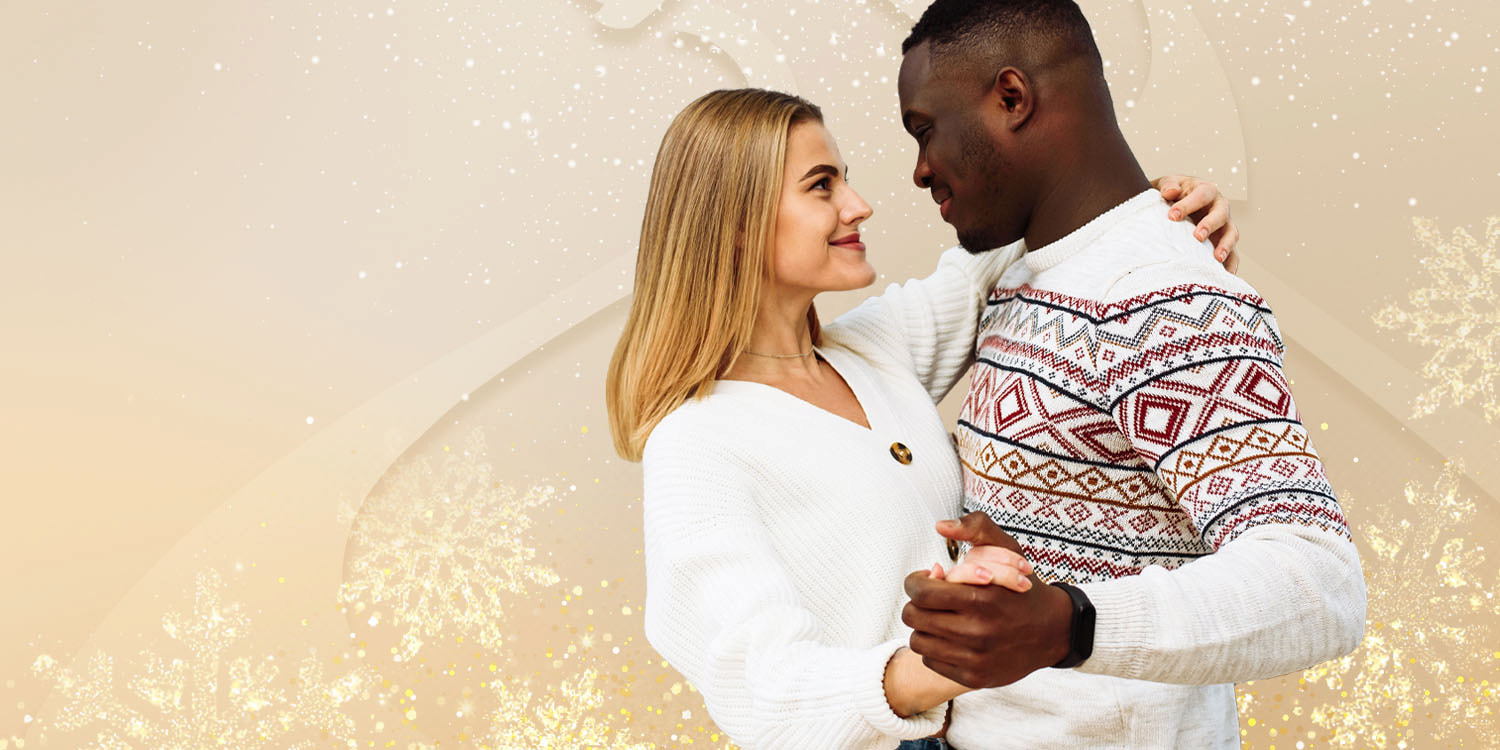 Young couple dancing together for the Holidays